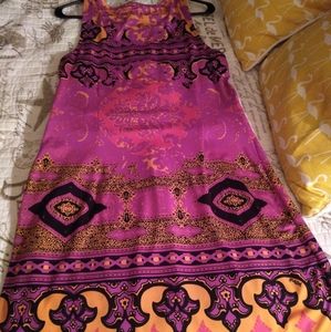 Cleaning out closets of dresses never worn.